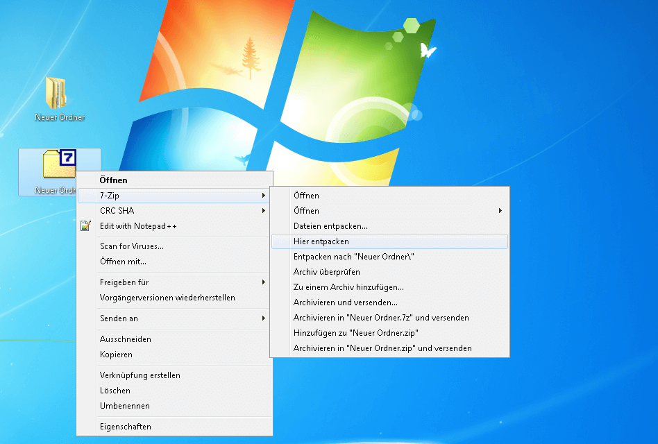 Screenshot vom Windows-Desktop, auf dem ein mit 7-Zip komprimierter Ordner entpackt werden soll